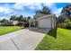 Charming single-story home with a well-maintained lawn, front porch, and attached two-car garage at 1034 Steelechase Ln, Hanahan, SC 29410