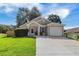 Charming single-story home with well-manicured lawn and attached one car garage at 1034 Steelechase Ln, Hanahan, SC 29410