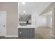 Modern kitchen featuring quartz countertops, gray cabinetry, and stainless steel appliances at 1034 Steelechase Ln, Hanahan, SC 29410
