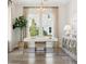 Bright home office featuring a modern desk, stylish decor, and a large window with natural light at 1051 Scotch Bonnet Way, Summerville, SC 29485