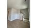 Entryway featuring wood-look floors leading to staircase with wood handrail and white risers at 1051 Scotch Bonnet Way, Summerville, SC 29485