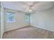 Bright bedroom with neutral carpet, light colored walls, ceiling fan, and natural light at 106 Cicero Ct, Goose Creek, SC 29445