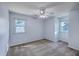 Bright bedroom with neutral carpet, light colored walls, ceiling fan, and natural light at 106 Cicero Ct, Goose Creek, SC 29445