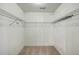 Empty walk in closet with wire shelving, neutral carpet, and white walls at 106 Cicero Ct, Goose Creek, SC 29445