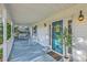 Relaxing front porch with a swing and a white rocking chair at 106 Cicero Ct, Goose Creek, SC 29445