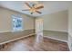 Light filled living room featuring updated laminate flooring at 106 Cicero Ct, Goose Creek, SC 29445