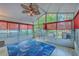 Bright sunroom with floor-to-ceiling windows, and tile flooring at 106 Cicero Ct, Goose Creek, SC 29445