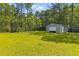 Backyard with batting cage and shed at 110 Huntington Ct, Walterboro, SC 29488