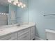 Bright bathroom with a marble countertop, modern vanity, and a classic mirror provide a luxurious feel at 110 Huntington Ct, Walterboro, SC 29488