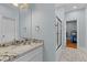 Bathroom featuring granite counters and a view through to the main bedroom at 110 Huntington Ct, Walterboro, SC 29488