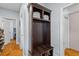Hallway features a dark brown coat rack with a bench with storage, coat hooks and shelves at 110 Huntington Ct, Walterboro, SC 29488