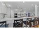Open-concept kitchen featuring a marble island with seating and modern appliances at 110 Huntington Ct, Walterboro, SC 29488