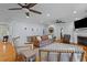 Elegant living room with hardwood floors, comfortable seating, and a classic fireplace at 110 Huntington Ct, Walterboro, SC 29488