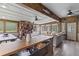 Well-lit sun room with rustic wood accents, a serving bar, and comfortable seating at 110 Huntington Ct, Walterboro, SC 29488