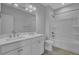 Bright bathroom featuring a double sink vanity with white cabinets and a shower-tub combo at 110 True Blue Lp, Summerville, SC 29486