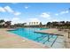 Beautiful community pool with lounge chairs and clear blue water, creating a resort-like atmosphere at 110 True Blue Lp, Summerville, SC 29486