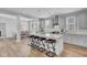 Spacious open kitchen with island seating, stainless appliances, and modern finishes at 110 True Blue Lp, Summerville, SC 29486
