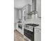 Modern kitchen with stainless steel range and microwave at 110 True Blue Lp, Summerville, SC 29486