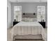 Bright bedroom featuring a designer headboard and a ceiling fan at 110 True Blue Lp, Summerville, SC 29486