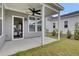 Cozy covered patio featuring outdoor furniture and a ceiling fan, perfect for relaxing outdoors at 110 True Blue Lp, Summerville, SC 29486