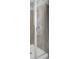 Close-up of a glass shower with grey, wood-look tiling and silver hardware at 110 True Blue Lp, Summerville, SC 29486