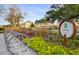 Beautiful street in Nexton featuring townhomes and landscaping with bike rack at 110 True Blue Lp, Summerville, SC 29486