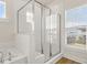 Modern bathroom with tiled shower and glass enclosure, and ample natural light at 113 Jackson Pond Ct, Summerville, SC 29486
