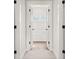 Bathroom view through doorway featuring white subway tiles, a tub, and hardwood floors at 113 Jackson Pond Ct, Summerville, SC 29486