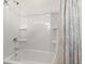Bathroom featuring a shower and tub combination with a tiled surround and shower curtain at 113 Jackson Pond Ct, Summerville, SC 29486