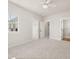 Bedroom with view of bathroom, closet, and neighborhood through window with blinds at 113 Jackson Pond Ct, Summerville, SC 29486