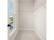 Walk-in closet with carpet, wire shelving, white trim and view of outside at 113 Jackson Pond Ct, Summerville, SC 29486