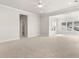 Bright living room featuring neutral walls, plush carpeting, and recessed lighting at 113 Jackson Pond Ct, Summerville, SC 29486