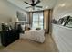 Cozy bedroom with comfortable-looking bed and stylish decorations including framed art at 114 Magnolia House Dr, Summerville, SC 29486