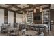 Cozy cafe area with counter seating, tables, and a coffee station, perfect for socializing at 114 Magnolia House Dr, Summerville, SC 29486