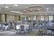 Spacious event space with elegant lighting, round tables, and seating for large gatherings at 114 Magnolia House Dr, Summerville, SC 29486