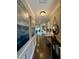 Elegant hallway with hardwood floors, neutral walls, decorative mirrors and attractive wall decor at 114 Magnolia House Dr, Summerville, SC 29486