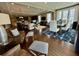 Open-concept living area combining kitchen, living room, and dining space with modern finishes at 114 Magnolia House Dr, Summerville, SC 29486