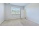 Bright bedroom features natural light from a window and neutral carpet at 124 Pontoria Dr, Knightsville, SC 29483