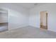This bedroom features neutral carpet and multiple doors at 124 Pontoria Dr, Knightsville, SC 29483