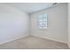 Comfortable bedroom featuring neutral carpet, white walls and a window at 124 Pontoria Dr, Knightsville, SC 29483