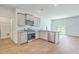 Modern kitchen features stainless steel appliances, granite countertops, and ample cabinet space at 124 Pontoria Dr, Knightsville, SC 29483