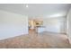 Open-concept living space with views into the kitchen and modern appliances at 124 Pontoria Dr, Knightsville, SC 29483