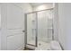 Elegant bathroom shower with frameless glass and built-in shelving for toiletries at 124 Pontoria Dr, Knightsville, SC 29483