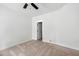 Empty bedroom with neutral carpet, ceiling fan, and open closet space at 1244 Crooked Oak Rd, Charleston, SC 29492