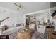 Bright, open-concept living room flowing into the kitchen and dining areas at 1244 Crooked Oak Rd, Charleston, SC 29492