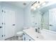 Bright bathroom featuring modern fixtures, white cabinetry, and a shower/tub combination at 125 Macy Cir, Goose Creek, SC 29445