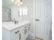 Bathroom showcasing a modern vanity with sleek black hardware, complemented by an updated mirror at 125 Macy Cir, Goose Creek, SC 29445