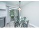 Cozy dining nook with modern lighting and easy access to outdoor patio at 125 Macy Cir, Goose Creek, SC 29445