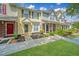Townhome exteriors, sidewalks and landscaped yards offer curb appeal at 125 Macy Cir, Goose Creek, SC 29445