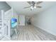 Bright living area featuring hardwood floors, a staircase and a modern ceiling fan at 125 Macy Cir, Goose Creek, SC 29445